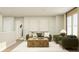 Cozy living room area with comfortable seating, neutral tones, and natural wood accents at 11640 Aubrey Ln, Fishers, IN 46040