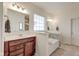 Bright bathroom featuring a vanity, separate tub, and tiled shower at 13875 Ambria Dr, McCordsville, IN 46055