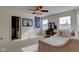 Bedroom with a pink velvet daybed, vanity, and natural light creating a cozy and inviting atmosphere at 13875 Ambria Dr, McCordsville, IN 46055