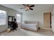 Bedroom with a pink velvet daybed, vanity, and natural light creating a bright and functional space at 13875 Ambria Dr, McCordsville, IN 46055