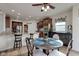 Dining area showcases wood floors and offers views of the updated kitchen area at 13875 Ambria Dr, McCordsville, IN 46055