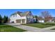 Beautiful home featuring a 3-car garage and professional landscaping in a desirable neighborhood at 13875 Ambria Dr, McCordsville, IN 46055