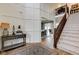 Grand foyer with a staircase and a glimpse into adjacent rooms at 13875 Ambria Dr, McCordsville, IN 46055
