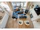 Bright living room with a large comfortable sectional sofa, fireplace, and an abundance of natural light at 13875 Ambria Dr, McCordsville, IN 46055