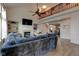 Inviting living room features a fireplace, built-in shelving, and an open view to the second floor at 13875 Ambria Dr, McCordsville, IN 46055