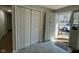 Welcoming entryway with double closets and neutral tile flooring at 1536 W 74Th Pl, Indianapolis, IN 46260