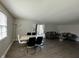 Open-concept living area features hardwood floors and stylish decor at 1536 W 74Th Pl, Indianapolis, IN 46260