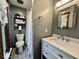 Small bathroom featuring a modern vanity, mirror, and tiled shower at 155 Boring Pl, Martinsville, IN 46151