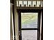 Charming front door with decorative window above, opening to landscaped front yard and brick pathway at 155 Boring Pl, Martinsville, IN 46151