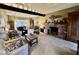 Inviting living room boasts a brick fireplace and large windows for natural light at 155 Boring Pl, Martinsville, IN 46151