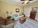 Inviting living room with a sofa, patterned chair, and a wooden chest at 155 Boring Pl, Martinsville, IN 46151