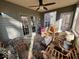 Relaxing sunroom features neutral decor, casual seating and ample natural light, perfect for entertaining at 155 Boring Pl, Martinsville, IN 46151