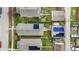 Bird's eye view of rooftops with solar panels in a residential neighborhood at 1715 E Kelly St, Indianapolis, IN 46203