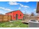Backyard featuring lawn, deck, and AC unit; great outdoor space at 1715 E Kelly St, Indianapolis, IN 46203