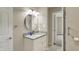 Bathroom vanity with granite countertop and stylish fixtures at 1715 E Kelly St, Indianapolis, IN 46203