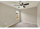 Bedroom featuring neutral walls and carpet, a ceiling fan with light, and a window at 1715 E Kelly St, Indianapolis, IN 46203