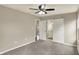 Main bedroom with ensuite bathroom and multiple windows offering ample light at 1715 E Kelly St, Indianapolis, IN 46203