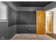 Bedroom provides natural light through a window and features neutral carpet at 1731 N Campbell Ave, Indianapolis, IN 46218
