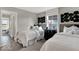 Cozy bedroom features twin beds, soft bedding, and stylish decor creating a welcoming space at 20147 Chad Hittle Blvd, Westfield, IN 46074