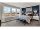 Bright bedroom boasts lots of natural light, a comfortable bed, and an inviting atmosphere at 20147 Chad Hittle Blvd, Westfield, IN 46074