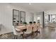 Formal dining area with a wooden table, seating for eight, and stylish wall decor at 20147 Chad Hittle Blvd, Westfield, IN 46074