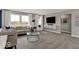 Living room with plush seating, modern decor, and plenty of natural light at 20147 Chad Hittle Blvd, Westfield, IN 46074