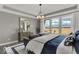 Inviting main bedroom with large windows, a decorative chandelier, and sophisticated furnishings at 20147 Chad Hittle Blvd, Westfield, IN 46074