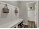 Organized mudroom with a built-in bench, coat hooks, and storage space for an efficient entryway at 20147 Chad Hittle Blvd, Westfield, IN 46074