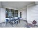 Covered patio with stylish seating, perfect for outdoor relaxation and entertaining at 20147 Chad Hittle Blvd, Westfield, IN 46074