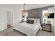 Comfortable bedroom with neutral tones and modern lighting fixture creating a cozy atmosphere at 2109 Boxwood Dr, Greenfield, IN 46140
