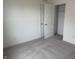 Bedroom with carpeted floors and closet at 2109 Boxwood Dr, Greenfield, IN 46140