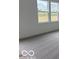 Carpeted bedroom featuring natural light from two windows at 2109 Boxwood Dr, Greenfield, IN 46140
