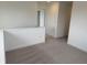 Upstairs hallway with carpeted floors at 2109 Boxwood Dr, Greenfield, IN 46140