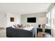 Bright living room featuring stylish furniture, modern decor, and large windows at 2152 Foothill Dr, Greenfield, IN 46140