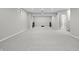 Spacious basement with carpet and neutral walls, perfect for entertaining and relaxing at 2231 Reston Ln, Columbus, IN 47203