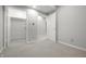 Finished basement area featuring carpet, neutral walls, and access to a closet at 2231 Reston Ln, Columbus, IN 47203