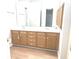 Bathroom featuring wood cabinets, white countertops and flooring at 2231 Reston Ln, Columbus, IN 47203