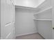 White closet featuring carpet and shelving at 2231 Reston Ln, Columbus, IN 47203