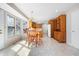 Bright dining area with bay window, chandelier, table and chairs at 2231 Reston Ln, Columbus, IN 47203
