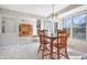 Open concept dining area with seamless access to living room and outdoor view at 2231 Reston Ln, Columbus, IN 47203