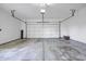 The empty two-car garage provides a clean space for parking and storage at 2231 Reston Ln, Columbus, IN 47203