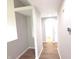 Neutral hallway with new flooring and fresh paint leading to bedrooms at 2231 Reston Ln, Columbus, IN 47203