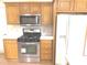 Updated kitchen features stainless steel appliances, oven and microwave at 2231 Reston Ln, Columbus, IN 47203