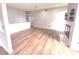 Bright living area with wood-look floors, fireplace, and open layout at 2231 Reston Ln, Columbus, IN 47203