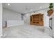 Spacious living room with light gray walls, carpet, fireplace and built-in entertainment center at 2231 Reston Ln, Columbus, IN 47203