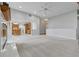 Open-concept living room with connecting access to the kitchen and dining area at 2231 Reston Ln, Columbus, IN 47203