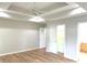 Main bedroom with tray ceilings, ceiling fan and two closets at 2231 Reston Ln, Columbus, IN 47203