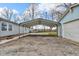 Spacious carport offering covered parking and protection from the elements for vehicles and equipment at 2305 S Rybolt Ave, Indianapolis, IN 46241