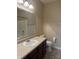 Bathroom with vanity, mirror, and neutral colors at 2610 Big Bear Ln, Indianapolis, IN 46217