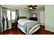 Cozy bedroom with a queen-size bed, hardwood floors and neutral wall color at 2700 Yellowwood Ct, Columbus, IN 47203
